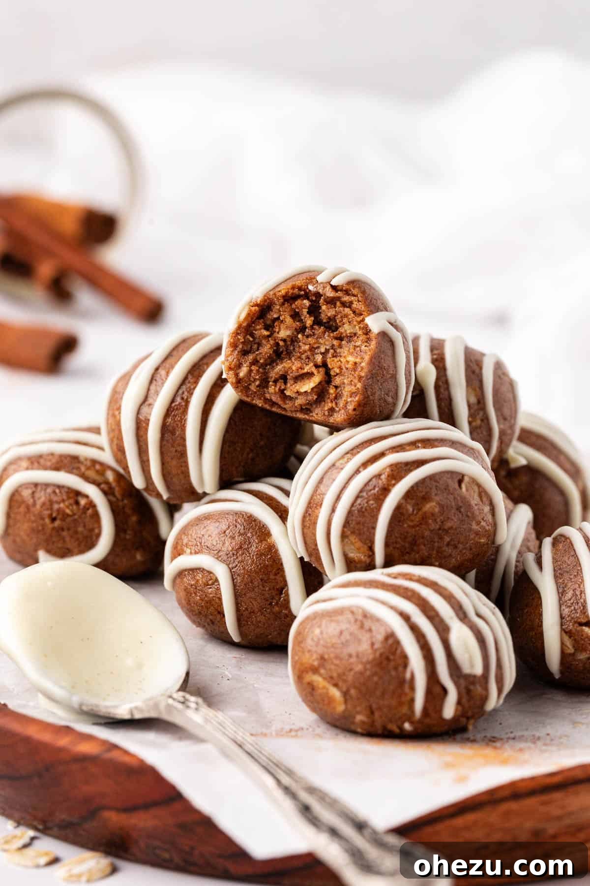 cinnamon roll energy bites stored in an airtight container