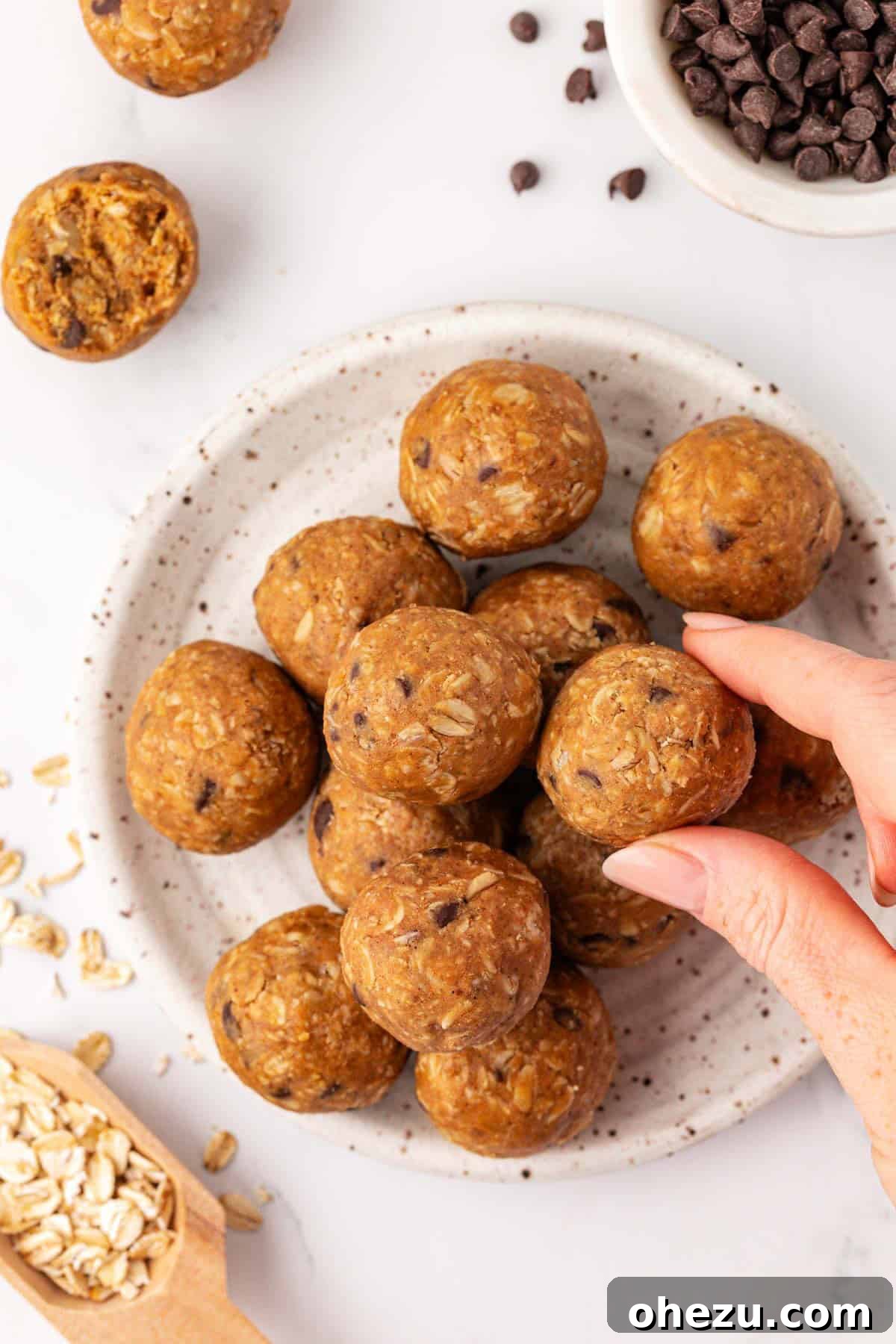 Delicious oatmeal cookie energy balls arranged artfully on a serving dish, highlighting their texture and appealing appearance.