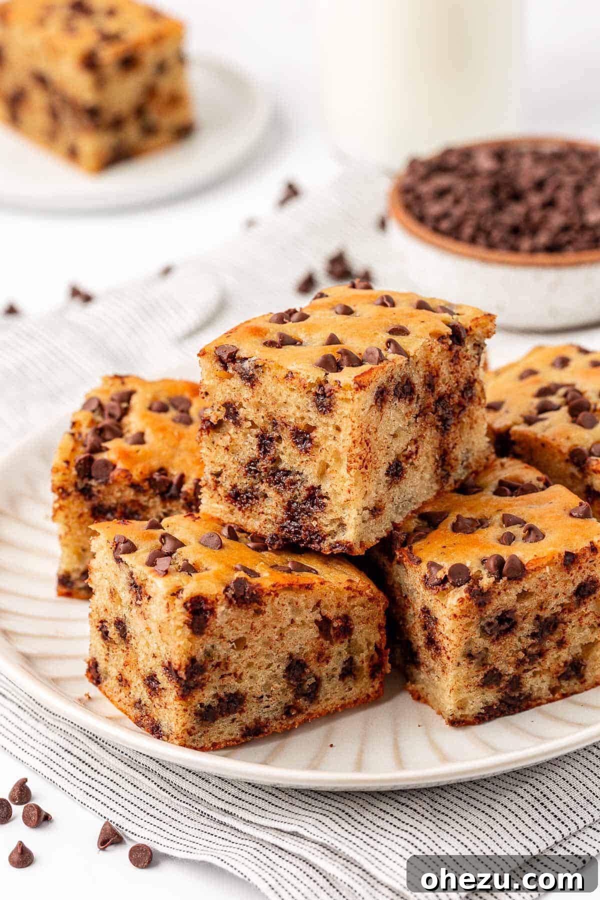 Tangy Greek Yogurt Treat Cake 2 Delicious Greek Yogurt Snack Cake with chocolate chips, sliced into squares