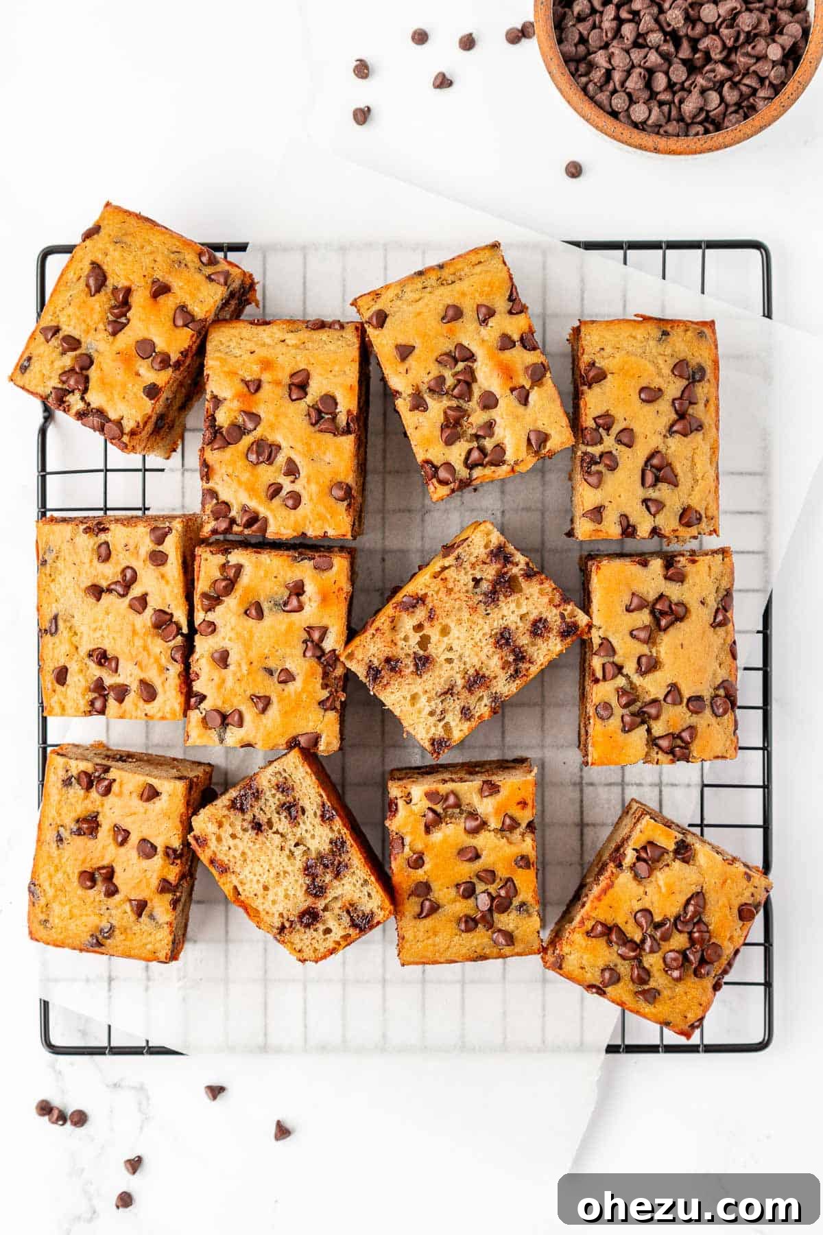 Tangy Greek Yogurt Treat Cake 19 Perfectly sized Greek Yogurt Snack Cake squares cooling on a wire rack