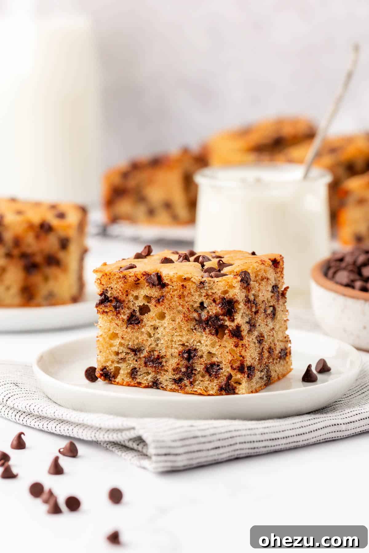 Tangy Greek Yogurt Treat Cake 22 Greek Yogurt Snack Cake slices neatly stored in an airtight container for freshness