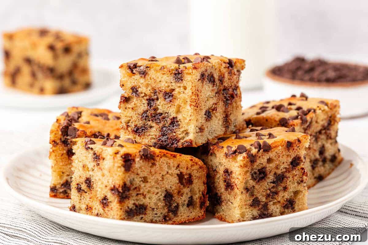 Tangy Greek Yogurt Treat Cake 23 Beautifully presented Greek Yogurt Snack Cake on a wooden board, ready to serve