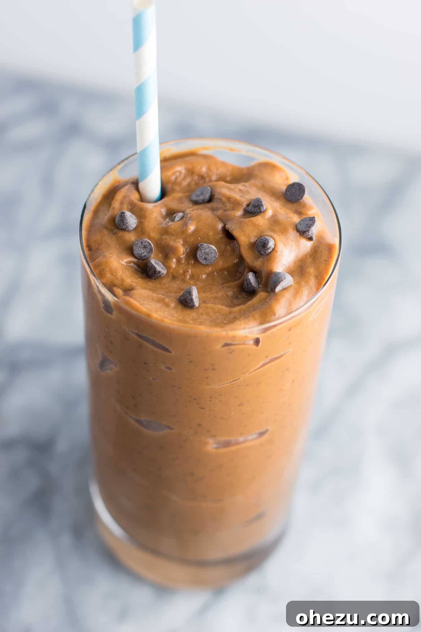 Healthy chocolate milkshake recipe made with just 5 ingredients. You won't believe the secret ingredient that makes it so creamy!