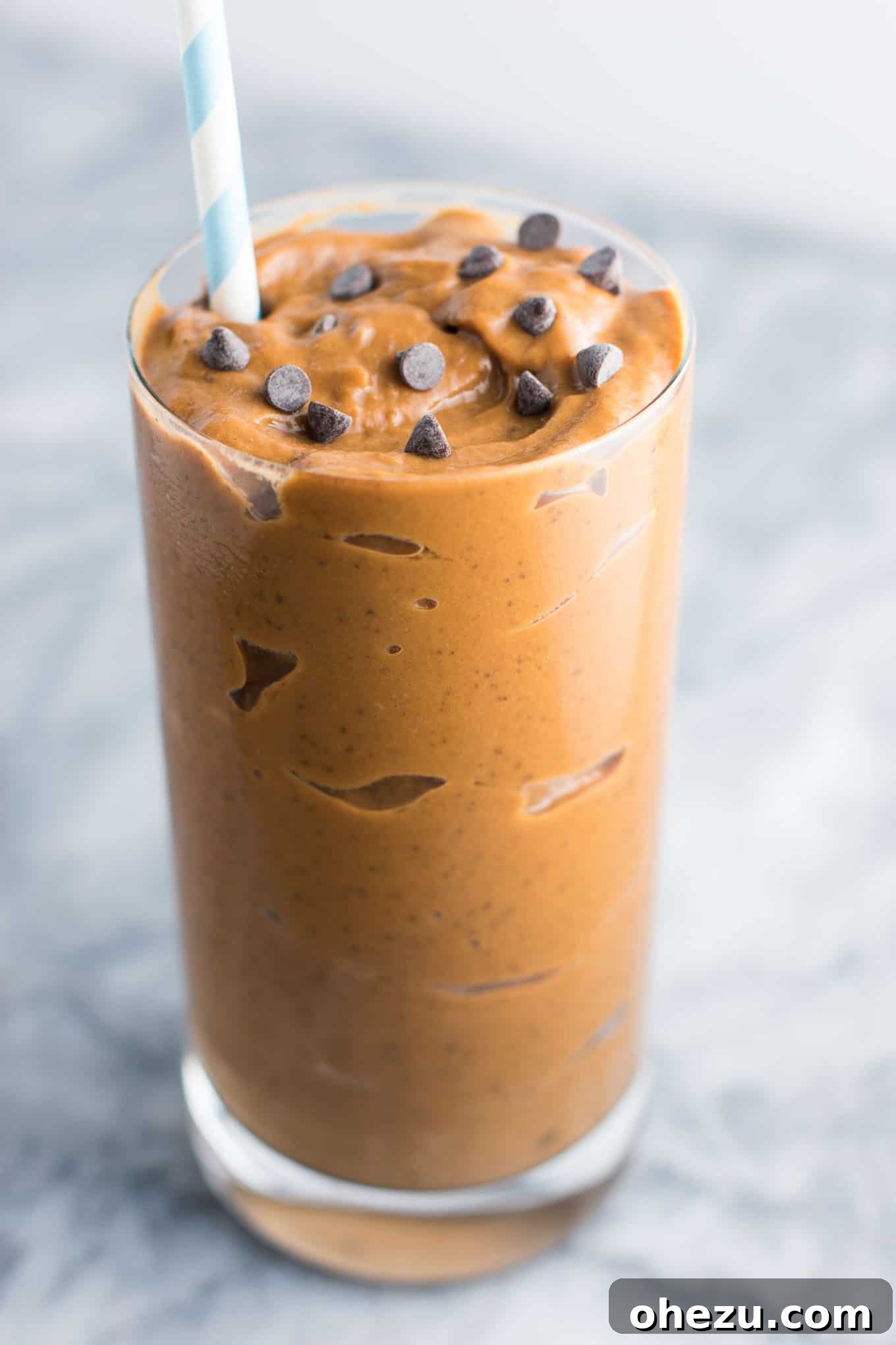 Healthy chocolate milkshake recipe made with just 5 ingredients. You won't believe the secret ingredient that makes it so creamy!