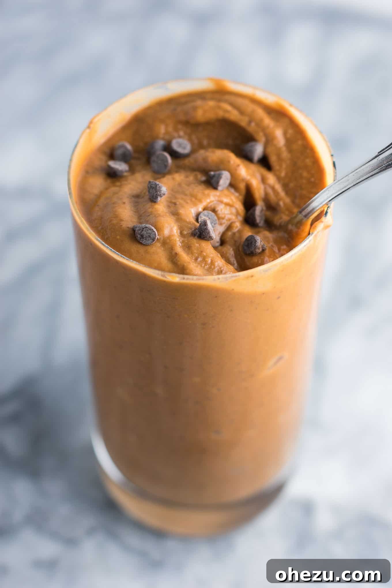 Healthy chocolate milkshake recipe made with just 5 ingredients. You won't believe the secret ingredient that makes it so creamy!