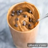 Healthy double chocolate milkshake recipe made with just 5 ingredients. You won't believe the secret ingredient that makes it so creamy!