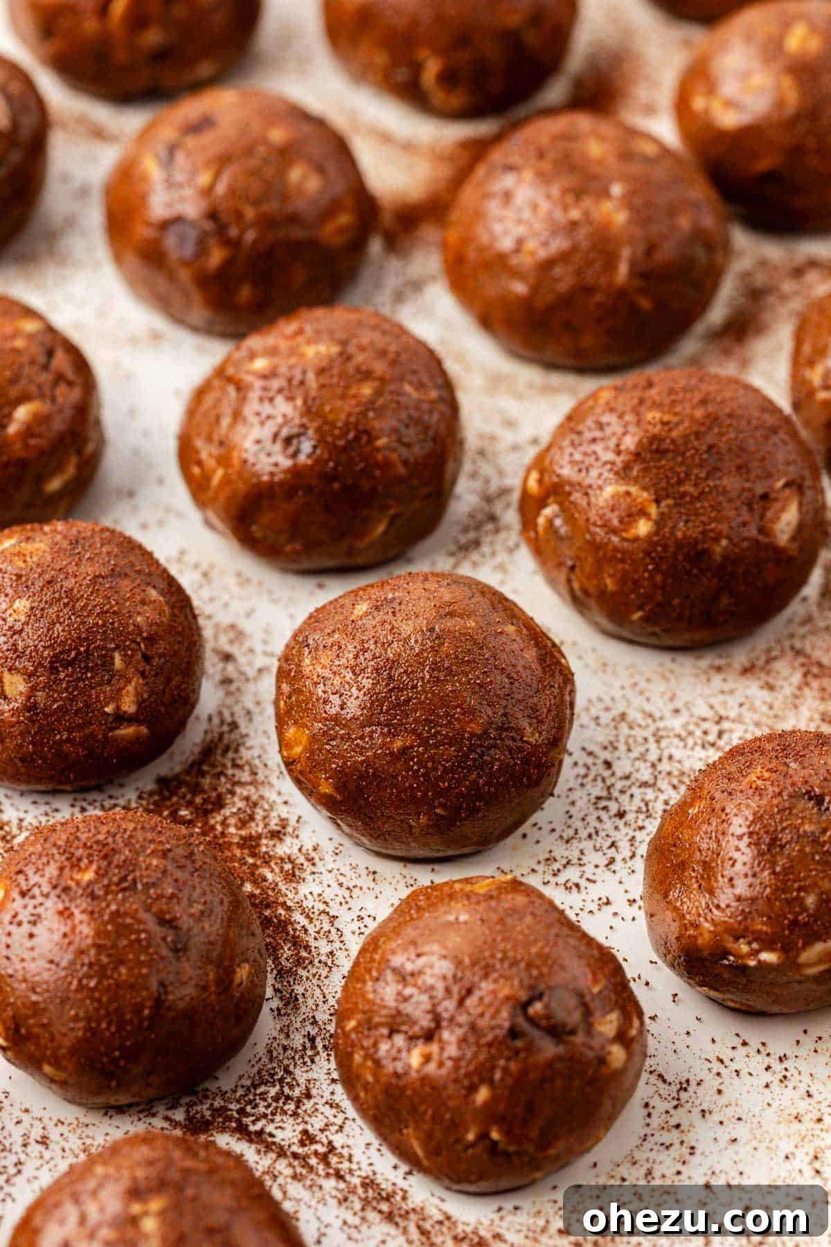 A stack of Espresso Energy Bites showcasing their appealing texture and dark color.