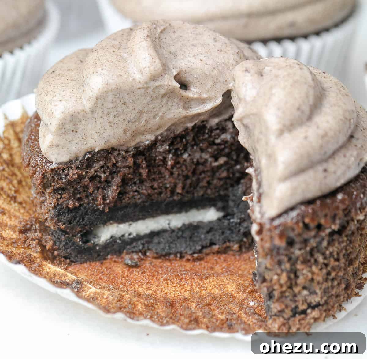 A tower of Triple Oreo Chocolate Cupcakes, inviting and delicious.