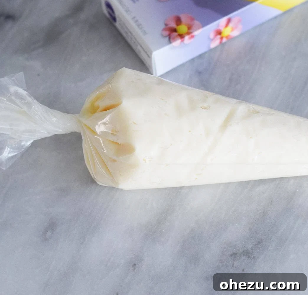Piping Frosting without a Piping Tip - Step 4: Fill and twist the bag