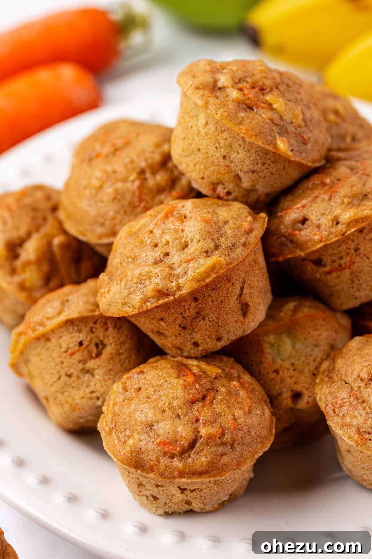 Poppable Perfection Muffins 2 Freshly baked ABC mini muffins arranged neatly, highlighting their golden-brown tops and wholesome texture.