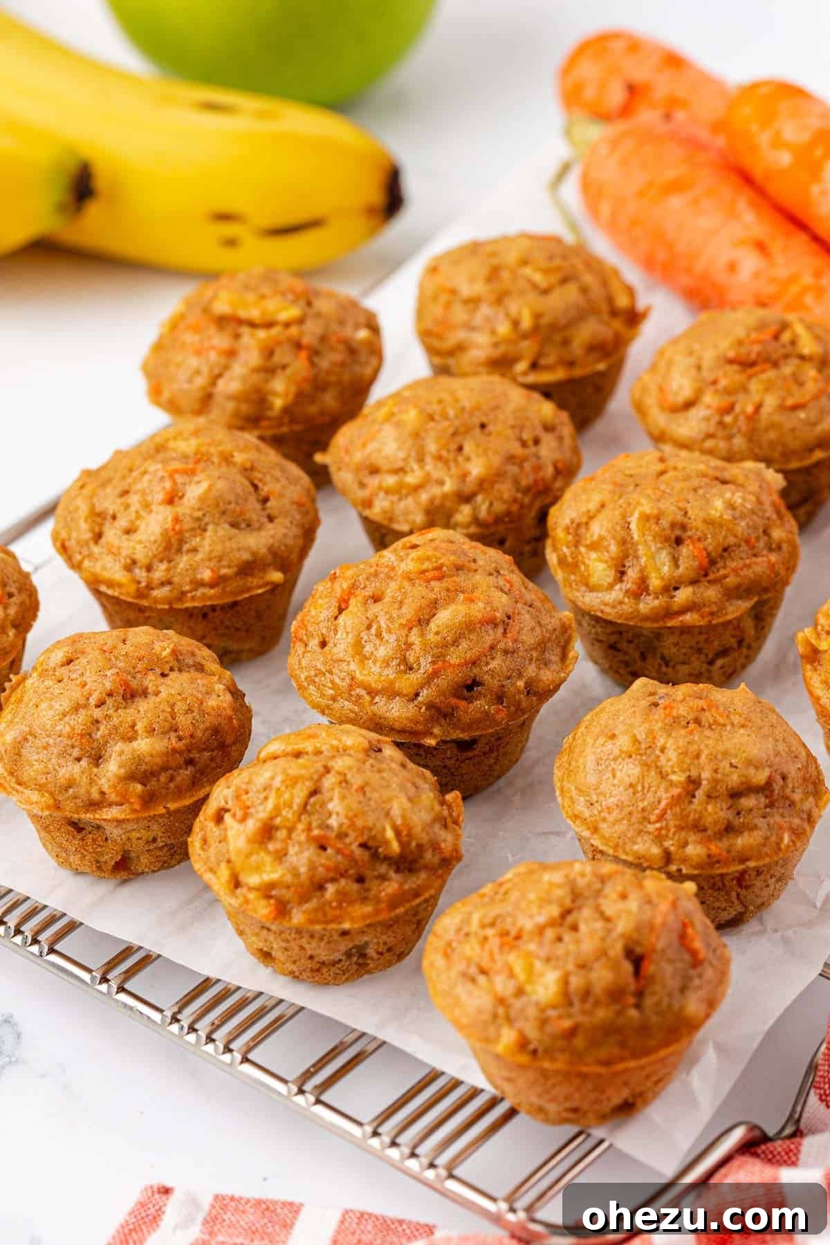 Poppable Perfection Muffins 17 Perfectly baked ABC mini muffins cooling on a wire rack, ready to be enjoyed.