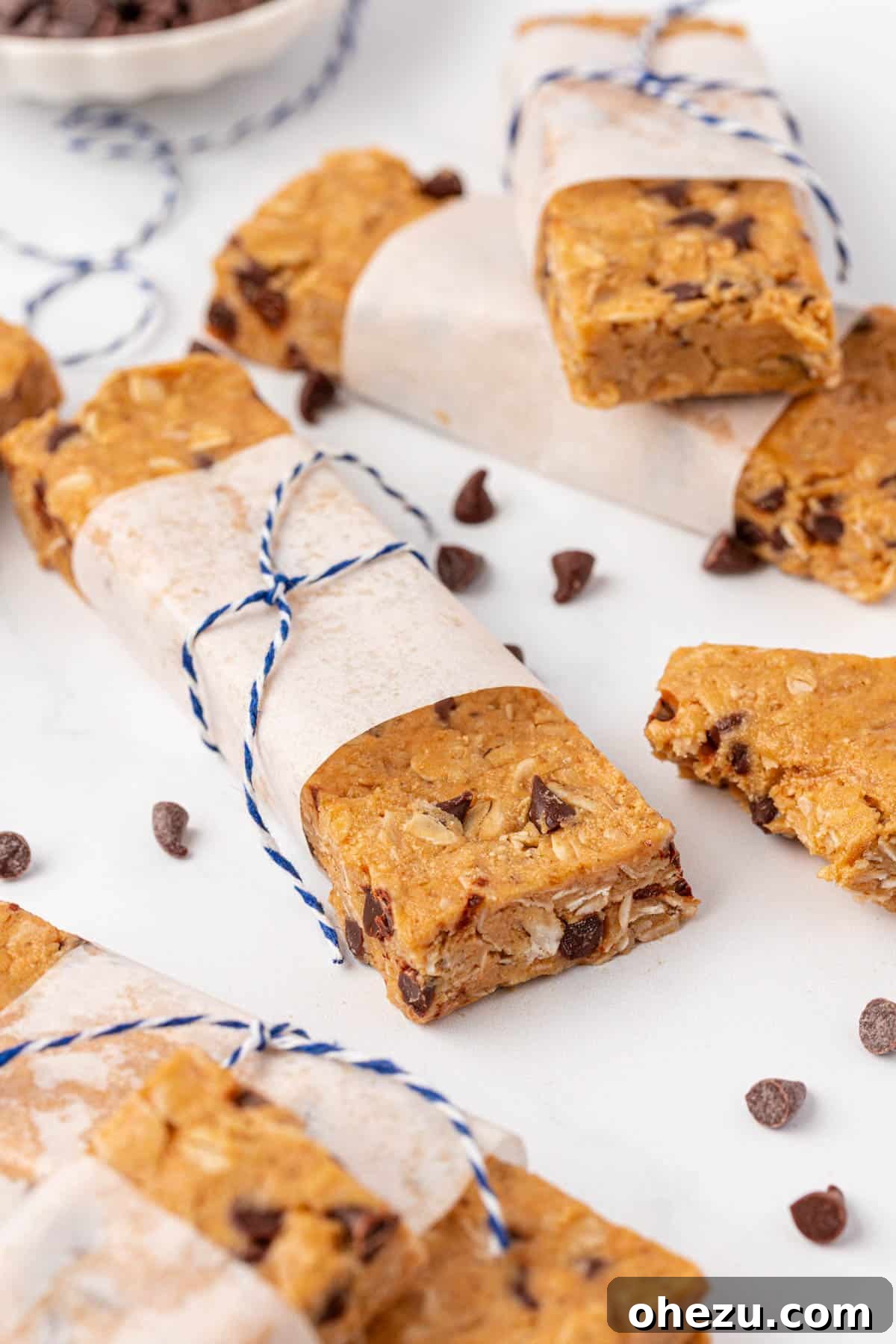 An inviting side view of perfectly portioned protein granola bars, showcasing their uniform shape and appealing texture.