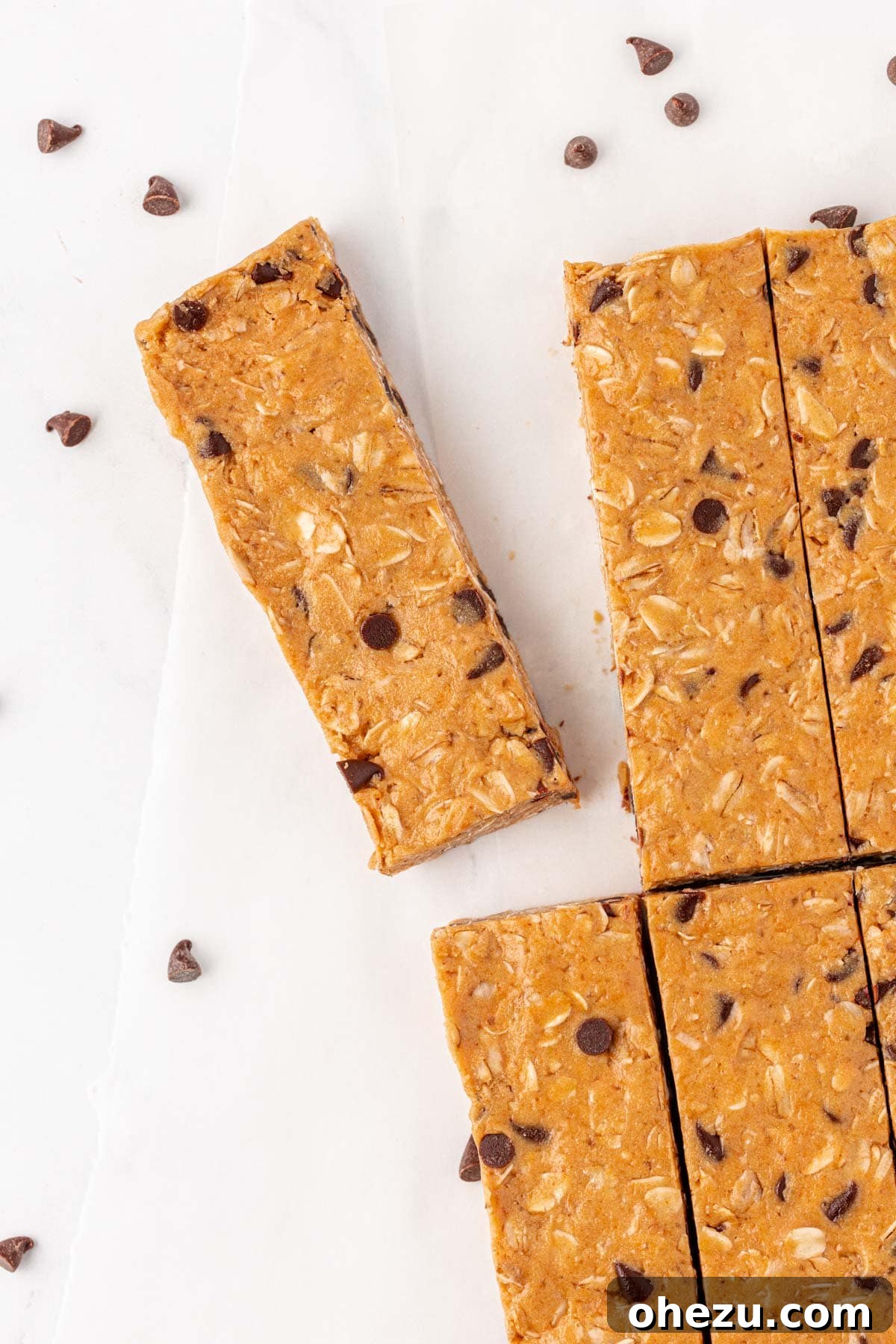 A final aesthetic shot of protein granola bars, perfectly aligned and ready for consumption, emphasizing their delicious appeal.