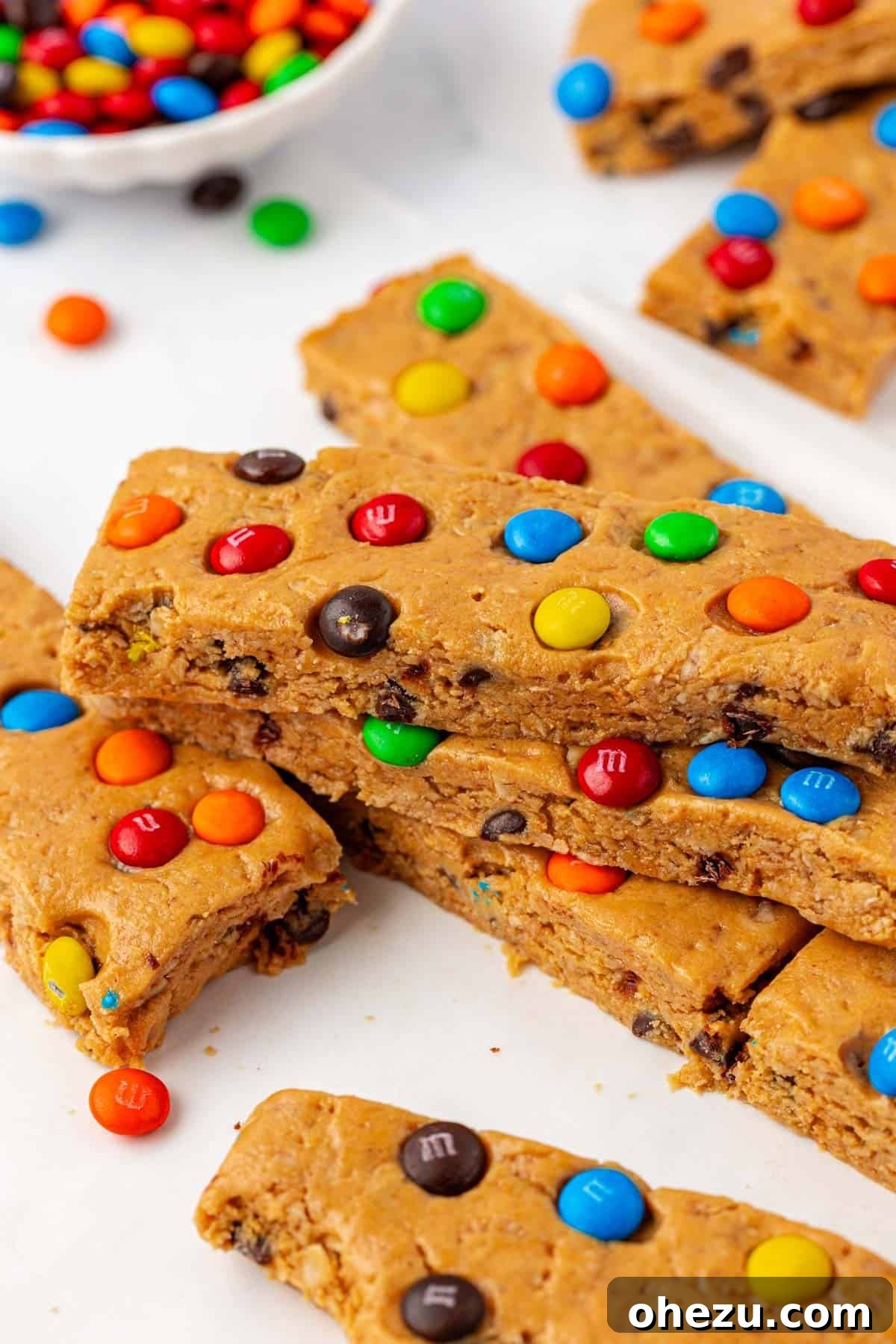 Several monster cookie protein bars on a cooling rack