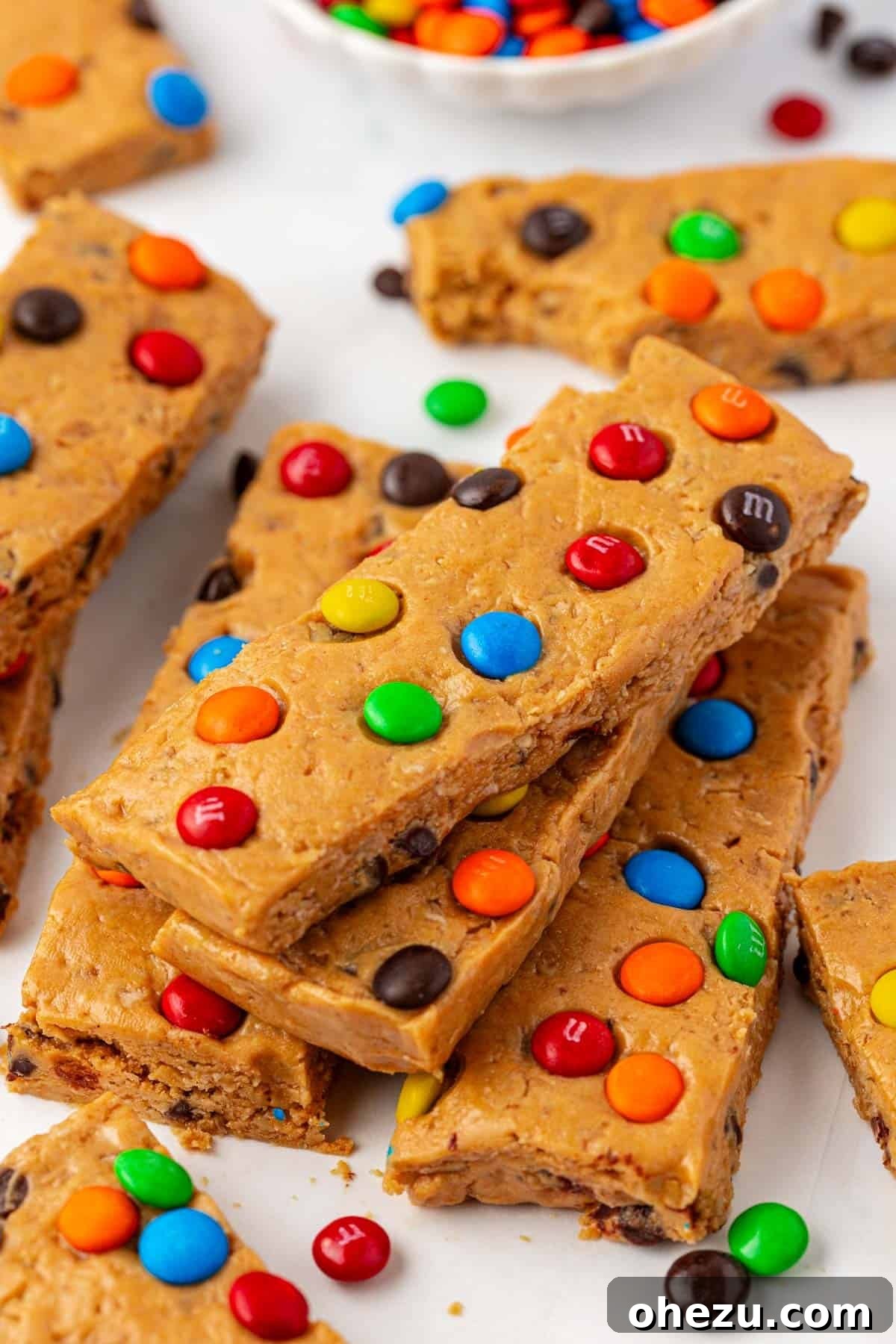 A final close-up of a Monster Cookie Protein Bar, showcasing vibrant colors and textures