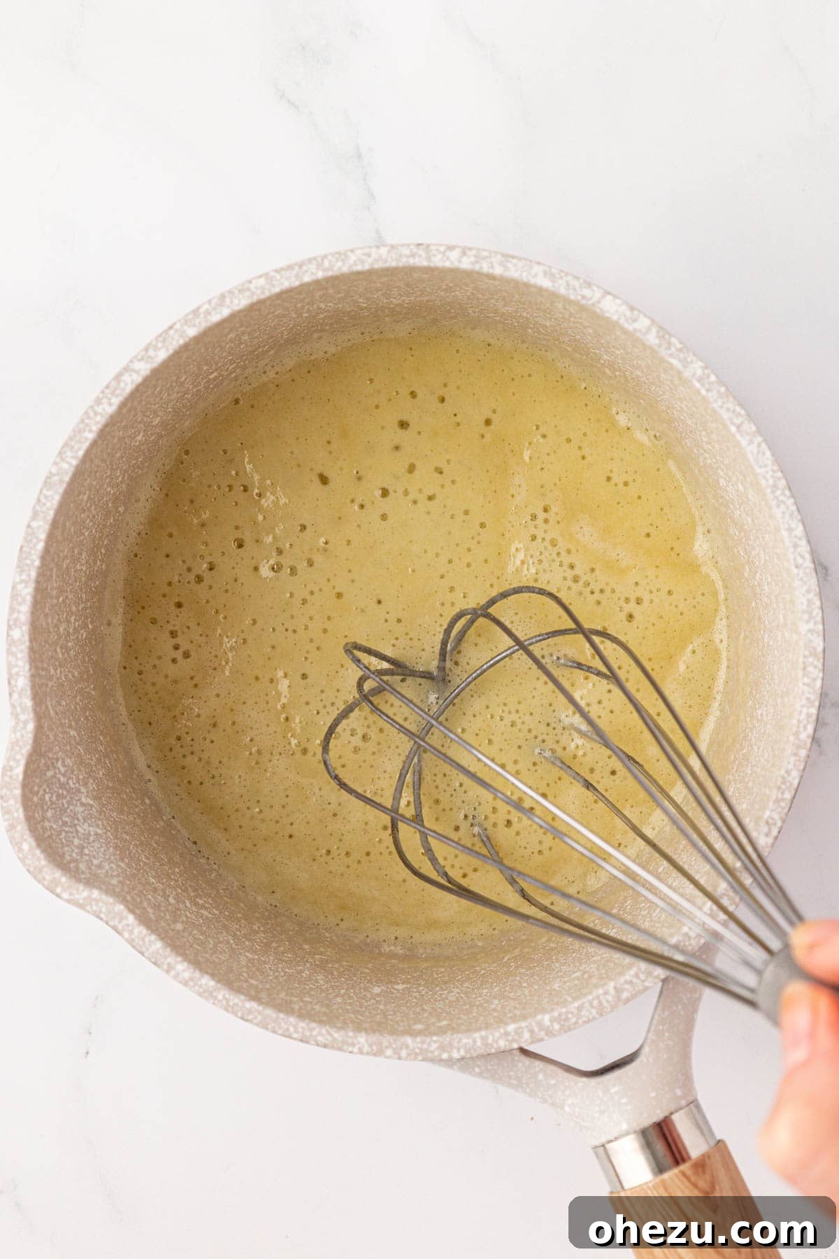 whisking together the butter and flour