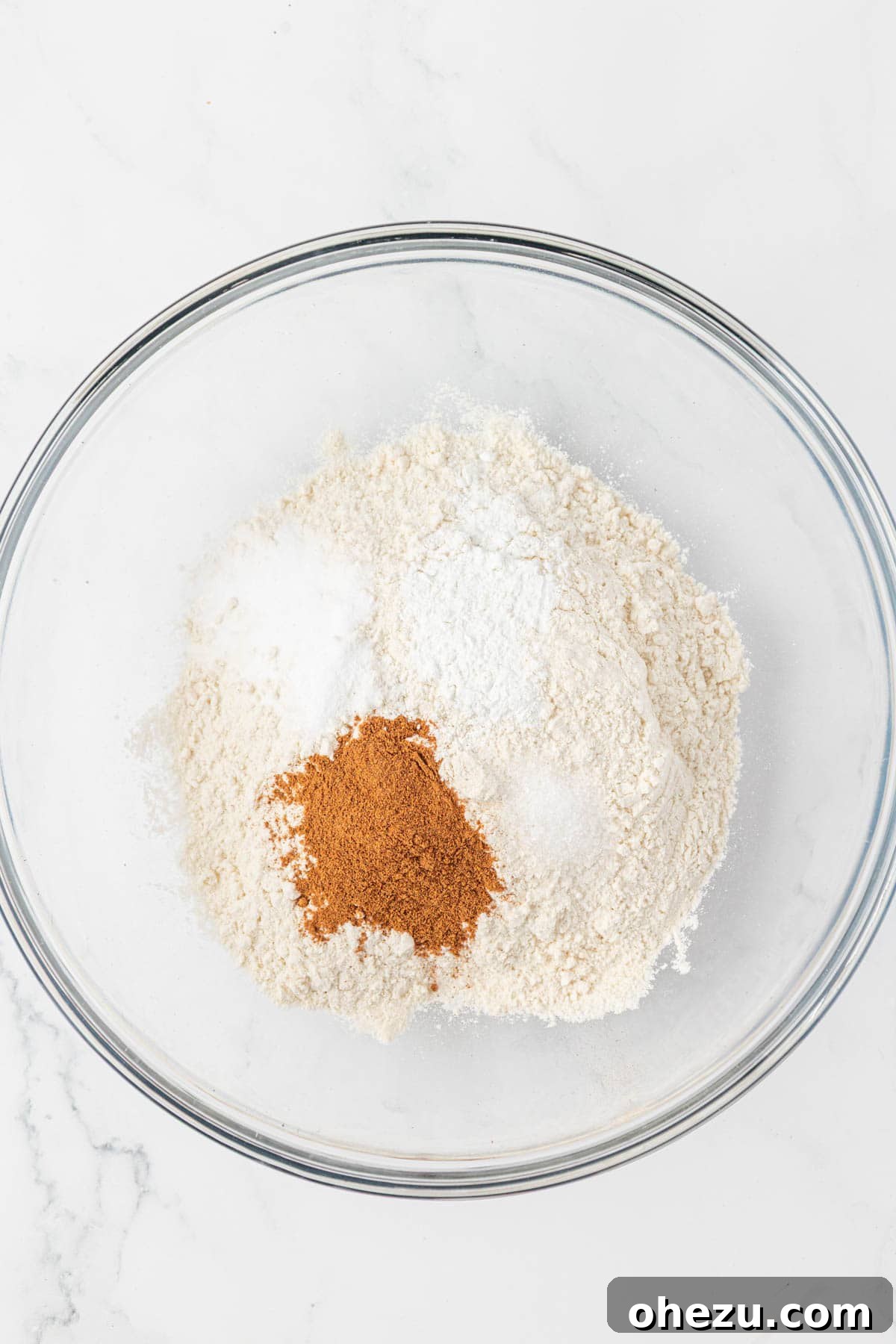 Spiced Pumpkin Donut Bites 5 All dry ingredients for pumpkin muffins measured out in a bowl