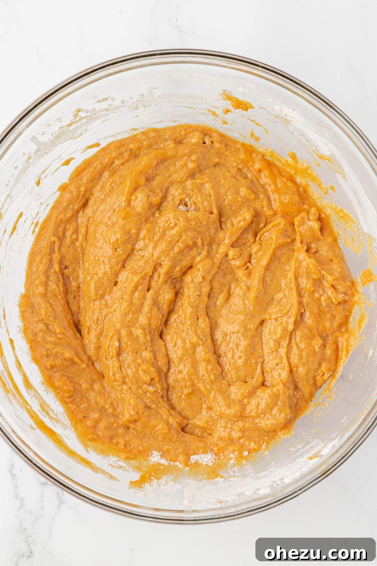 Spiced Pumpkin Donut Bites 10 Pumpkin donut mini muffin batter, perfectly mixed with a few lumps, ready for baking