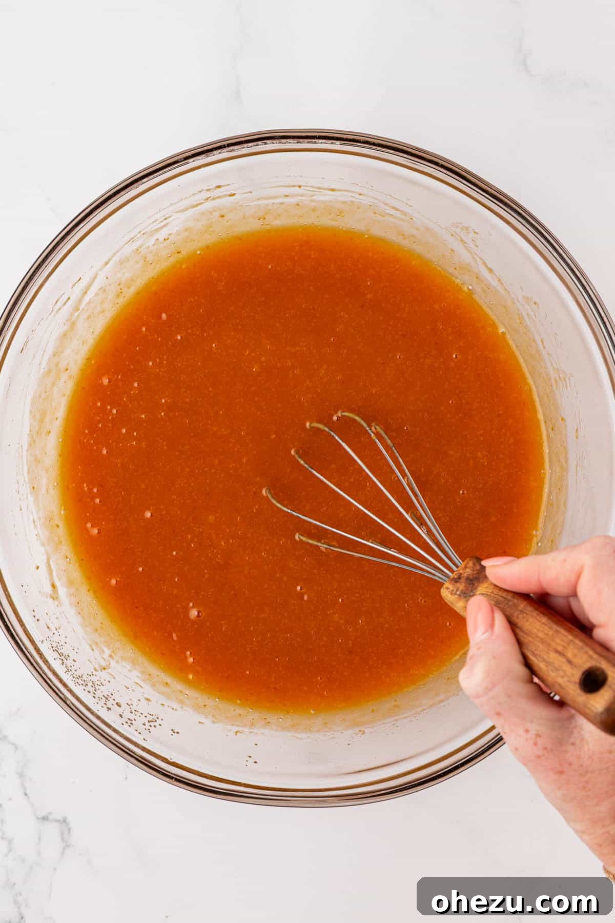 wet ingredients whisked together to form a smooth, orange mixture