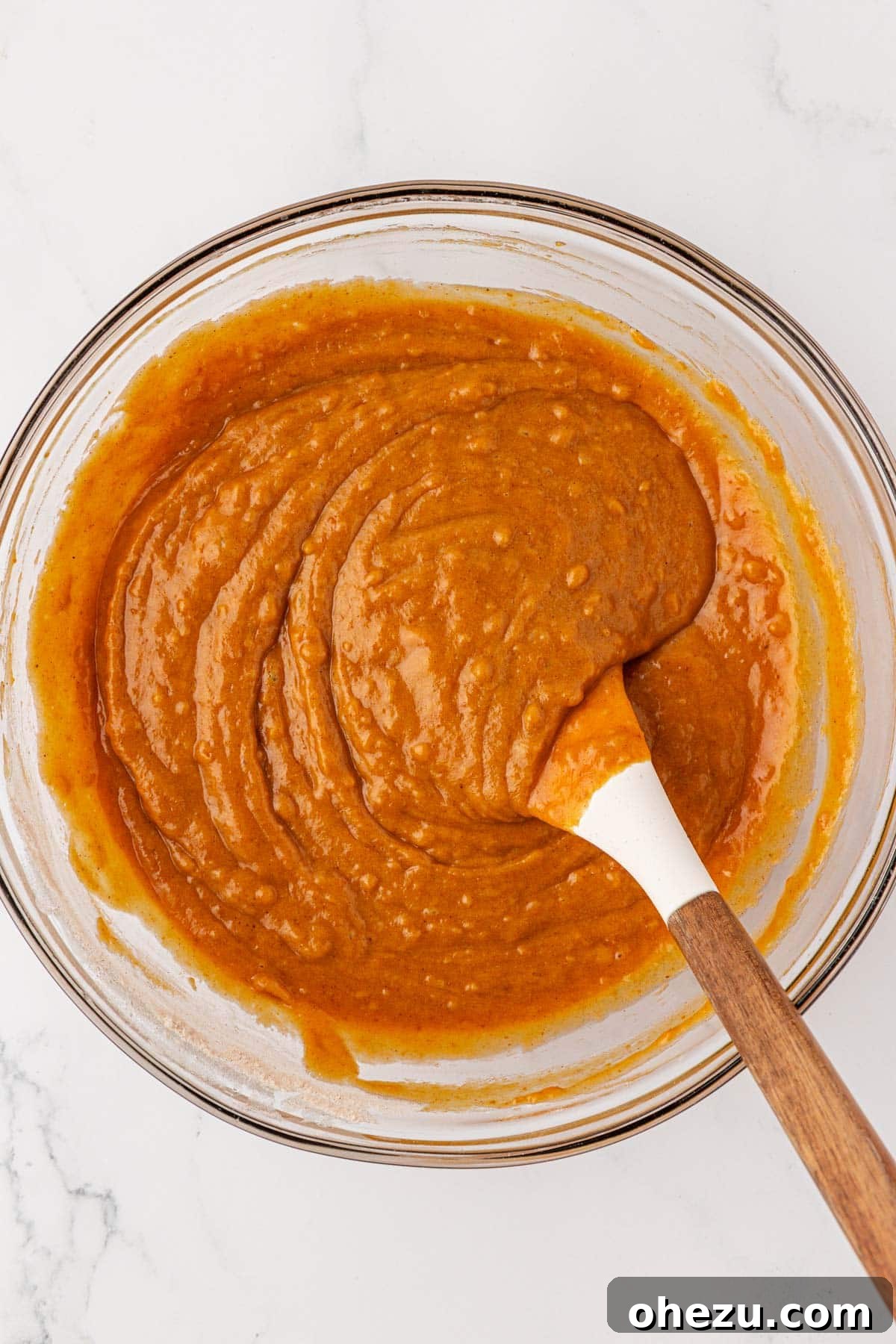 pumpkin bread batter mixed until just combined, showing a smooth but slightly lumpy texture