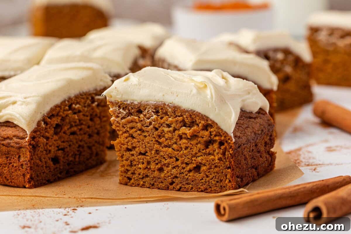 Delicious pumpkin snack cake with cream cheese frosting, ready to be served