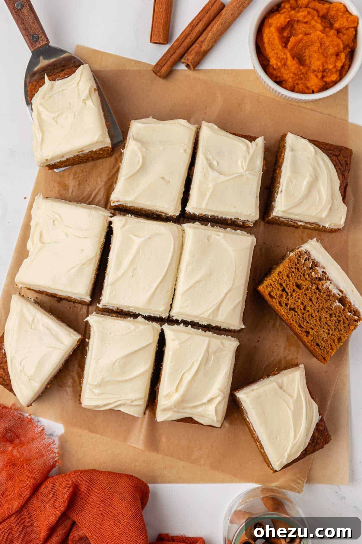 Freshly baked pumpkin snack cake, perfectly sliced into 12 delectable pieces