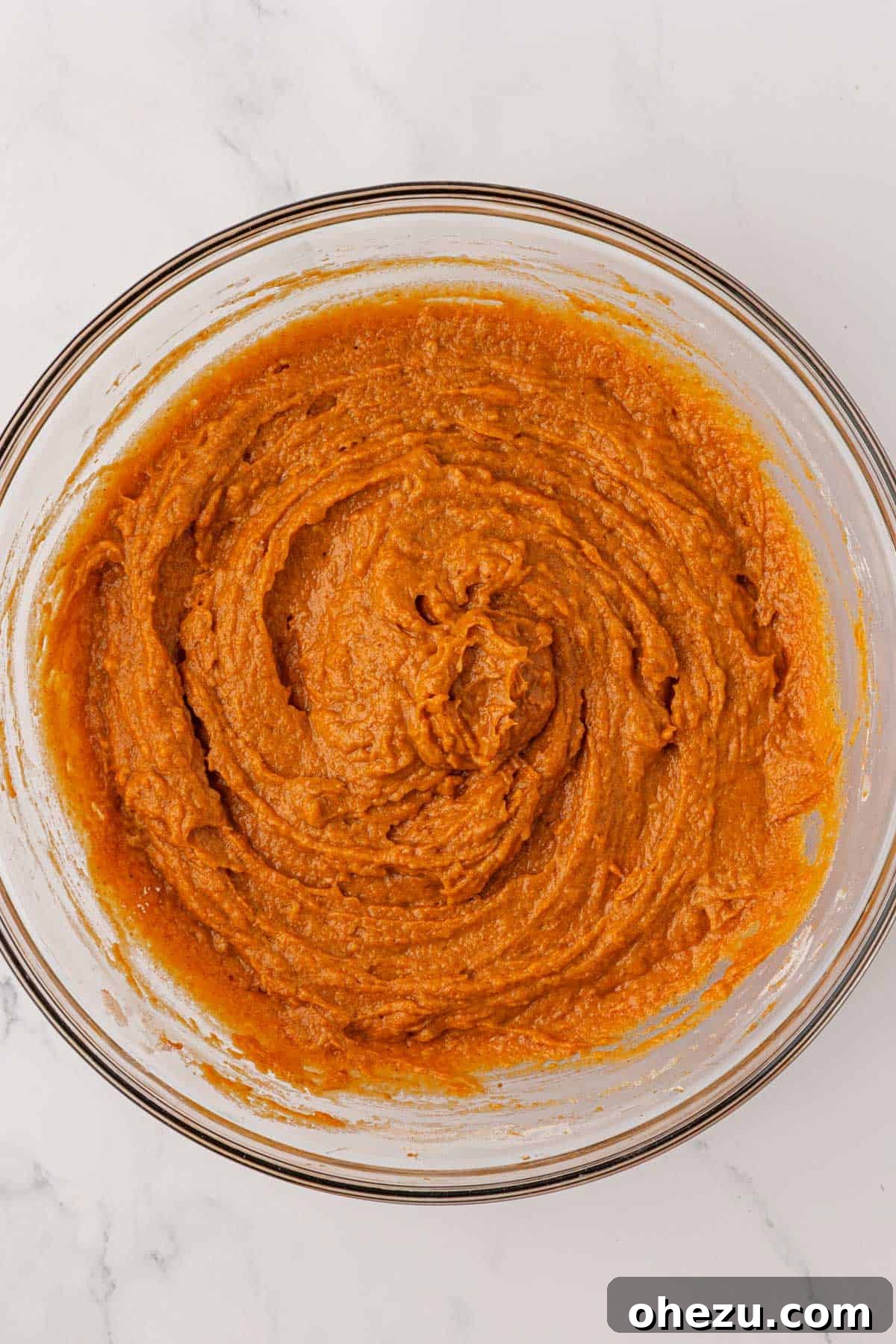Pumpkin snack cake batter, perfectly mixed and ready for the baking dish