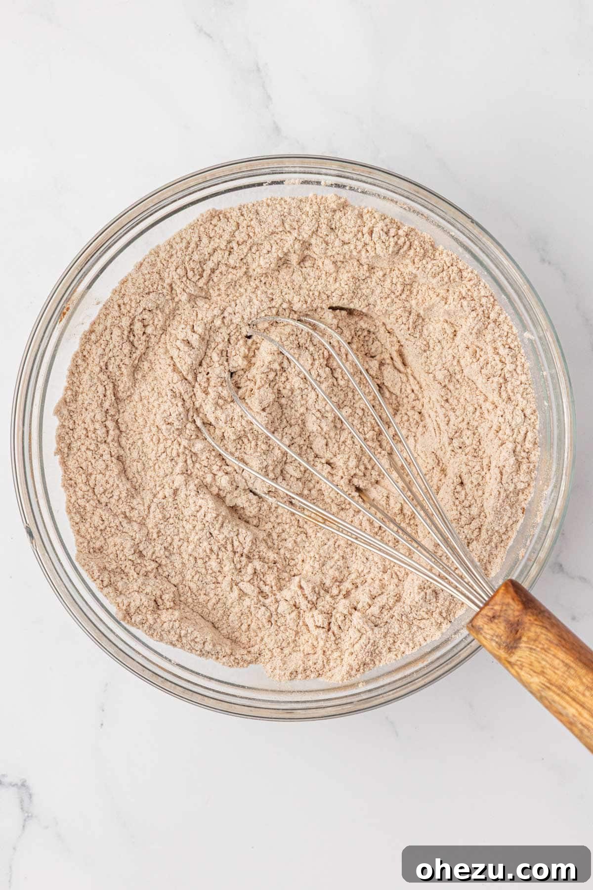 Whisked dry ingredients in a bowl, ready for mixing