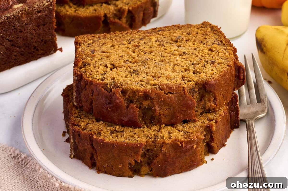 Slices of delicious pumpkin banana bread on a rustic plate, ready to be enjoyed