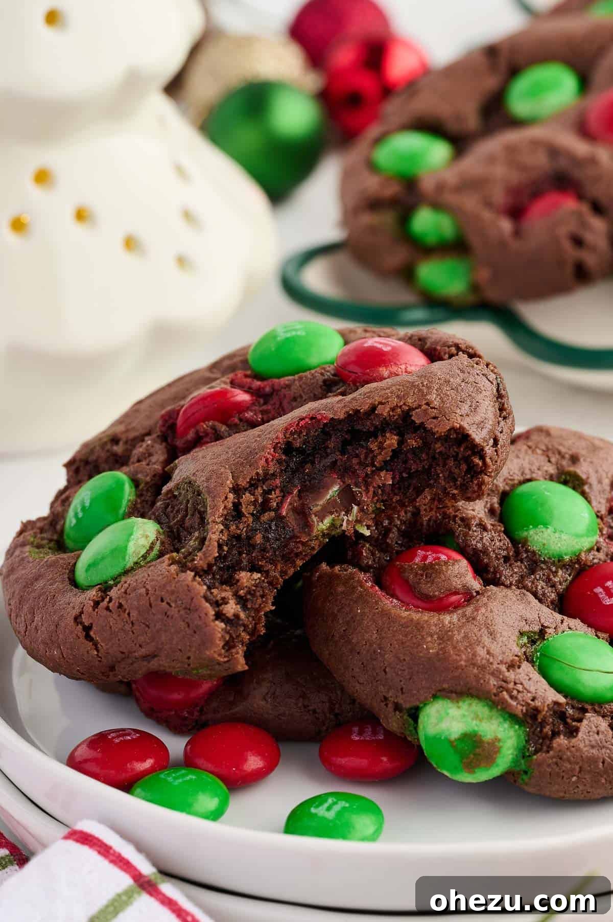 a chocolate Christmas cookie with a bite taken out, showing the soft interior