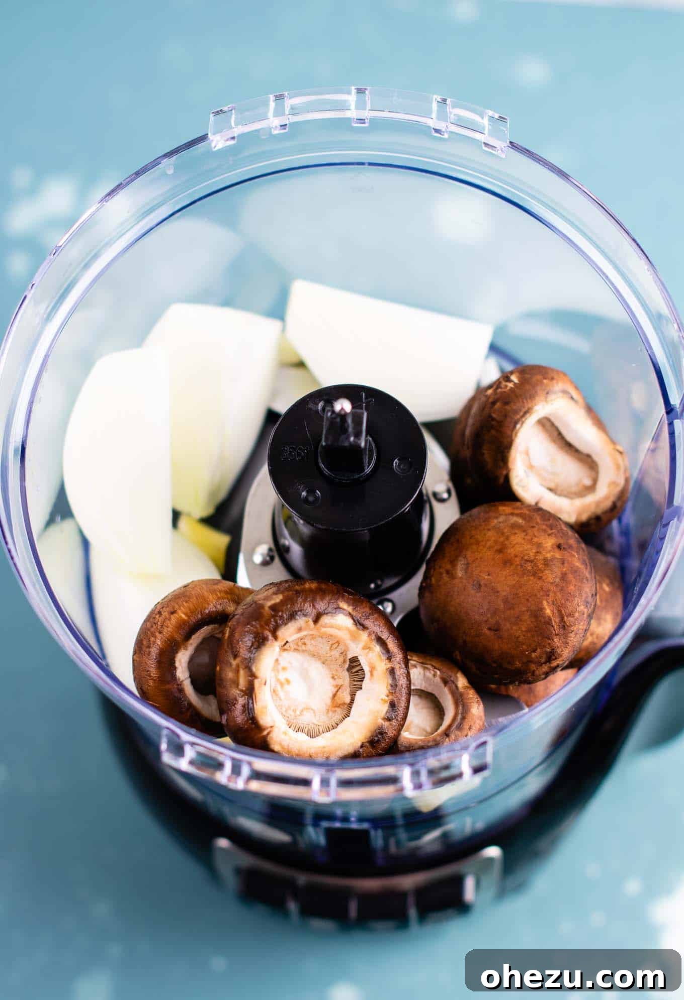 Minced mushrooms, garlic, and onion ready for cooking, forming the flavorful base for a hearty vegetarian lasagna soup.