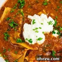 Easy one-pot vegetarian lasagna soup, a quick and delicious meatless dinner recipe.