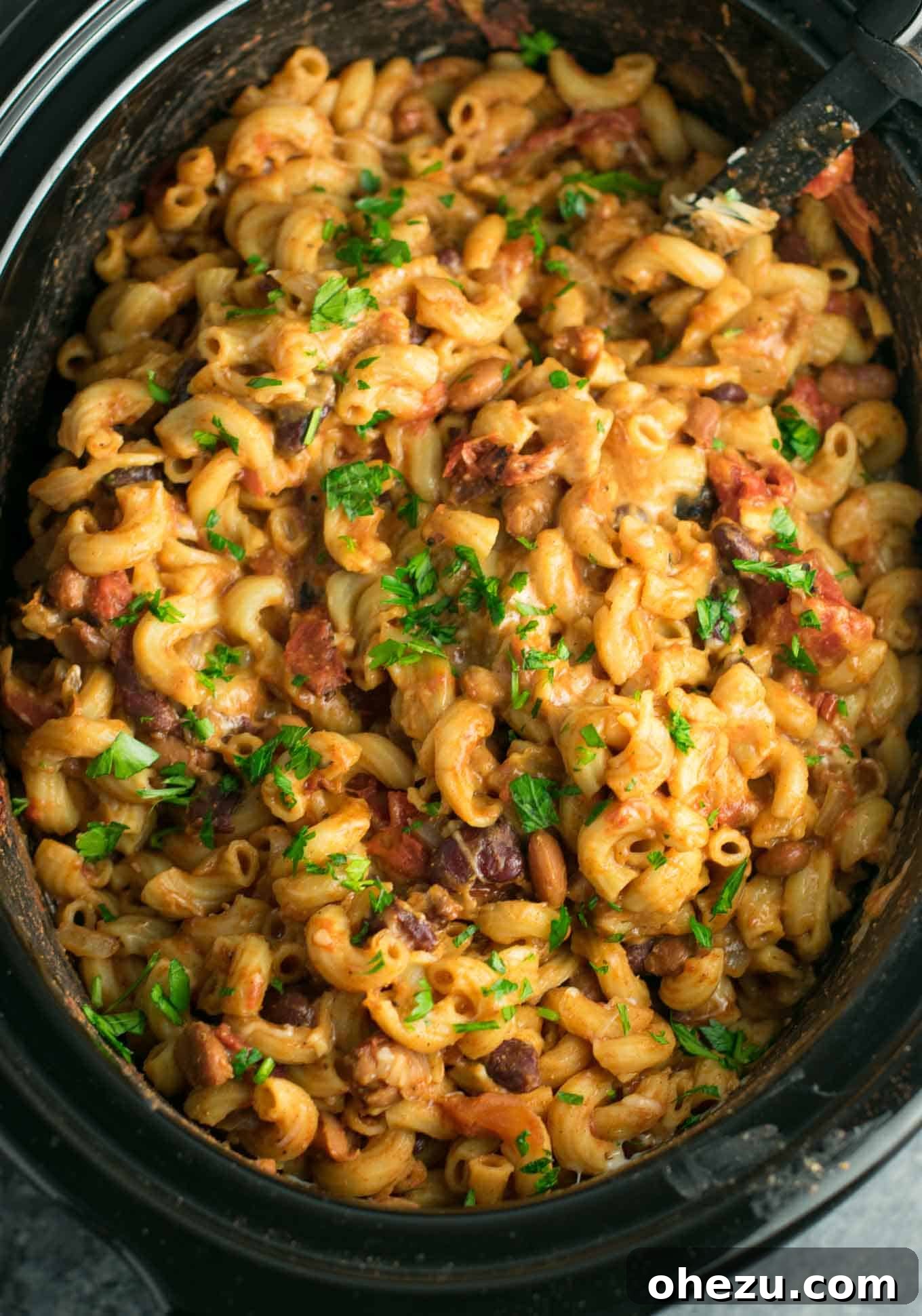 Creamy crock pot chili mac recipe with melted cheese