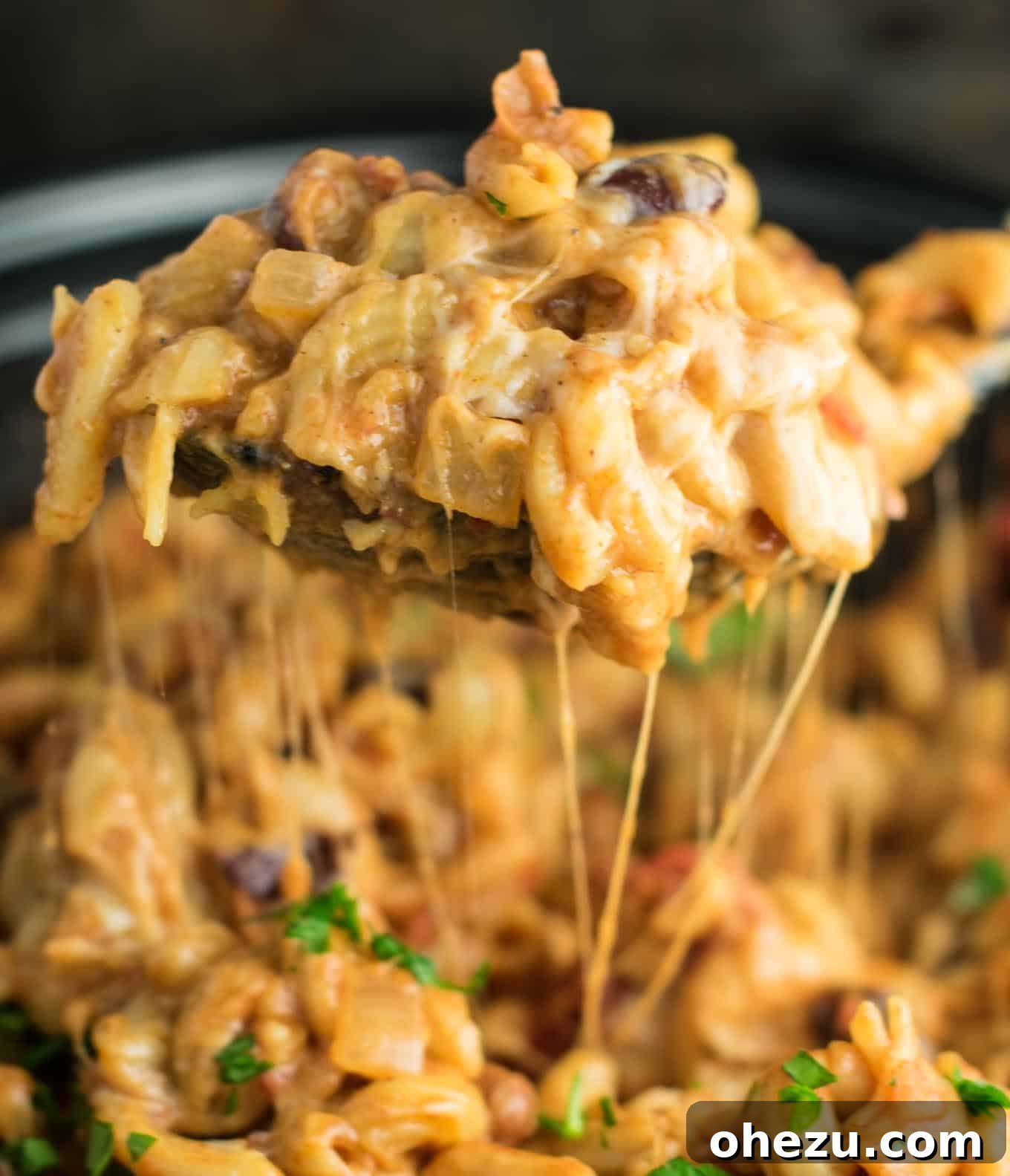 Meatless chili mac, showcasing rich texture and cheese