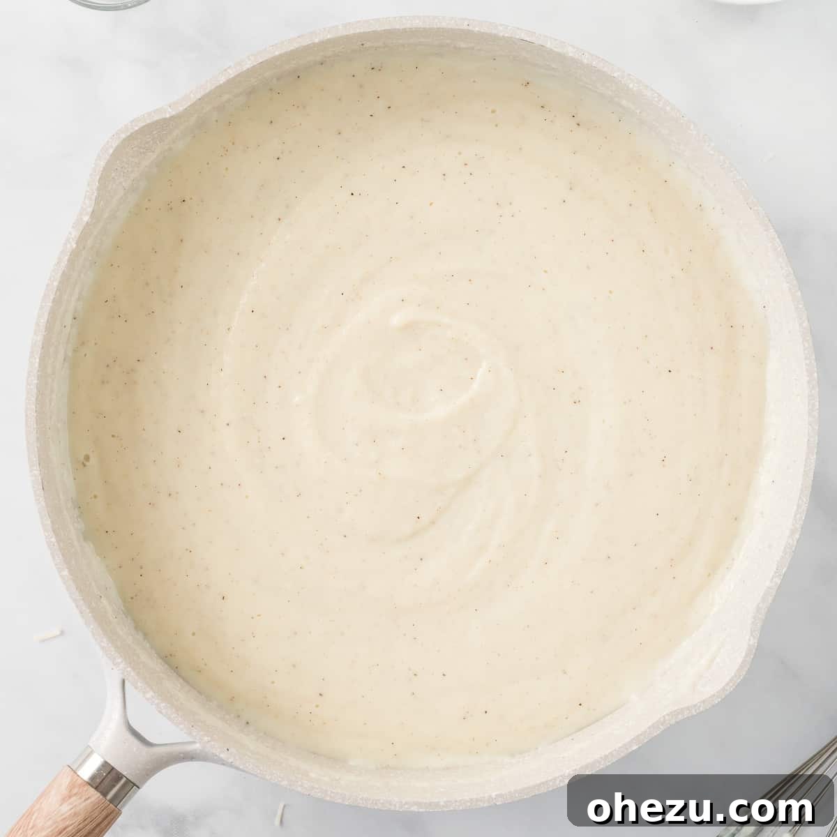 cauliflower Alfredo sauce in a skillet