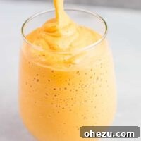 Frozen pumpkin pie smoothie – perfect healthy treat when you are craving pumpkin pie! This tastes JUST like it! #smoothie #pumpkinpie #dessert #healthy #pumpkin #healthydessert