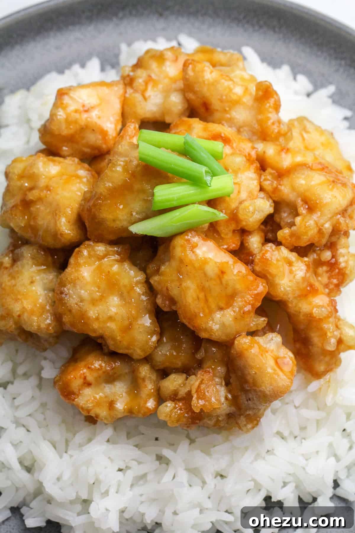 A beautifully presented bowl of Crispy Honey Chicken PF Changs Copycat, ready for indulgence