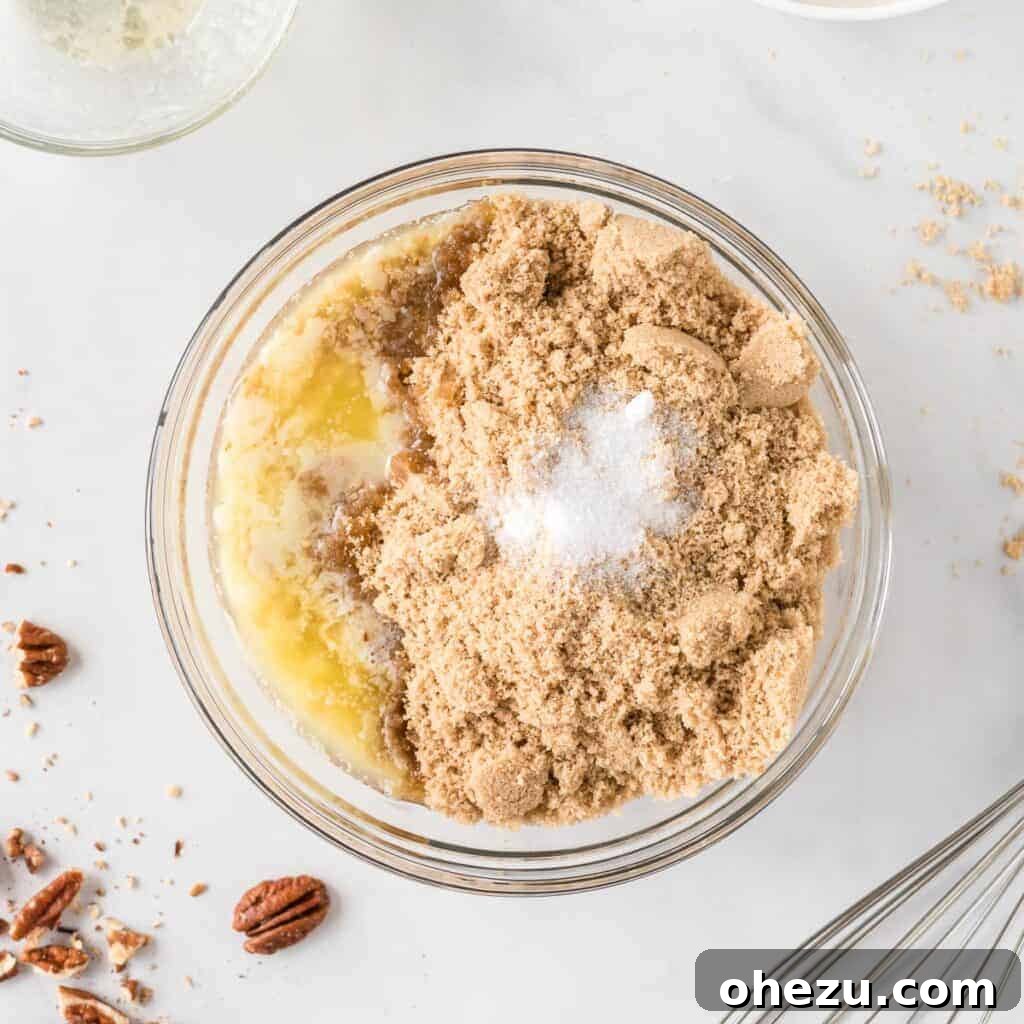 Golden Gluten-Free Sweet Potato Bake 9 Ingredients for the gluten-free pecan topping: pecan crumbs, melted butter, brown sugar, and salt, in a bowl