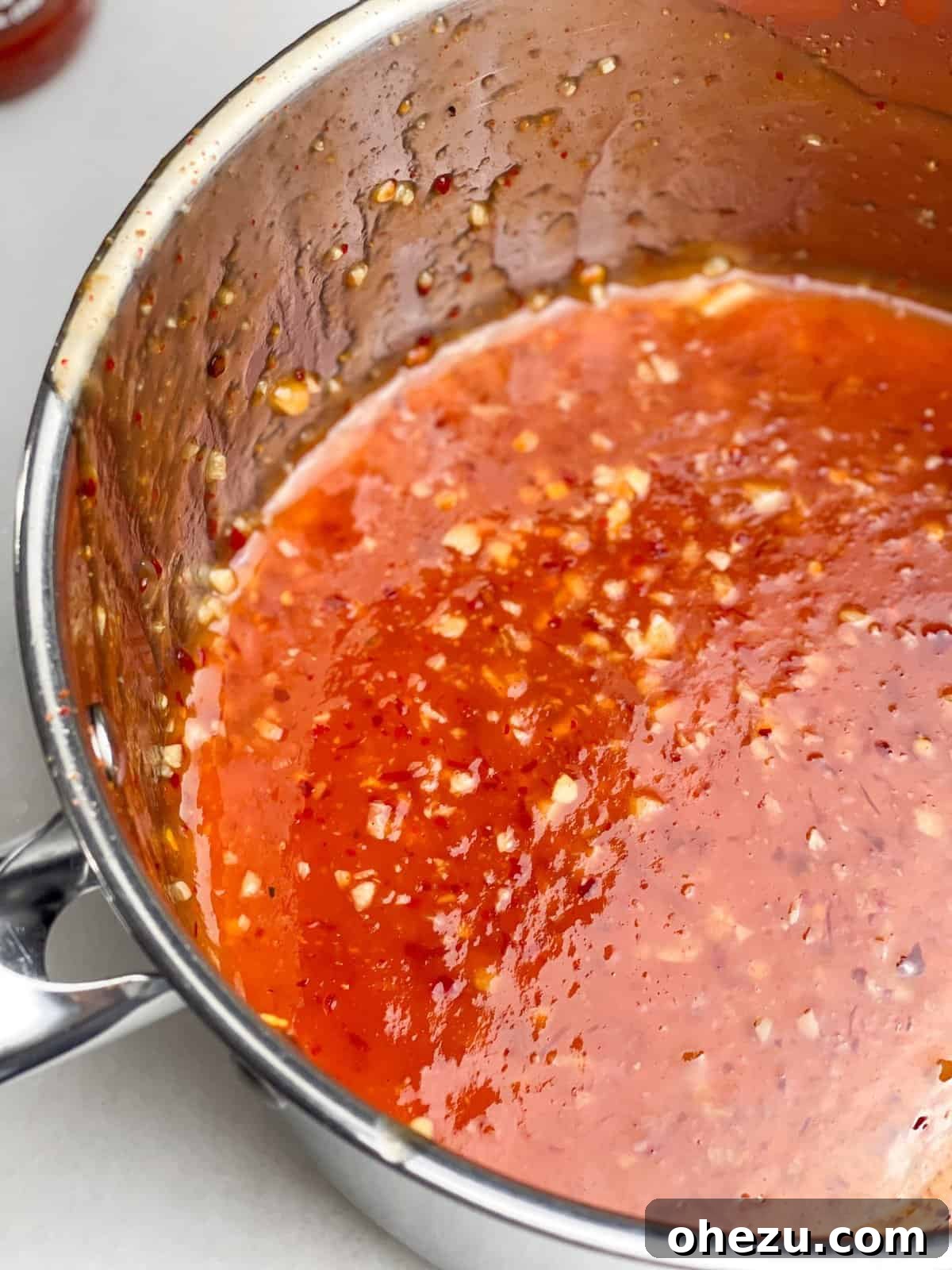 Delicious homemade sweet chili sauce in a jar, ready to be served