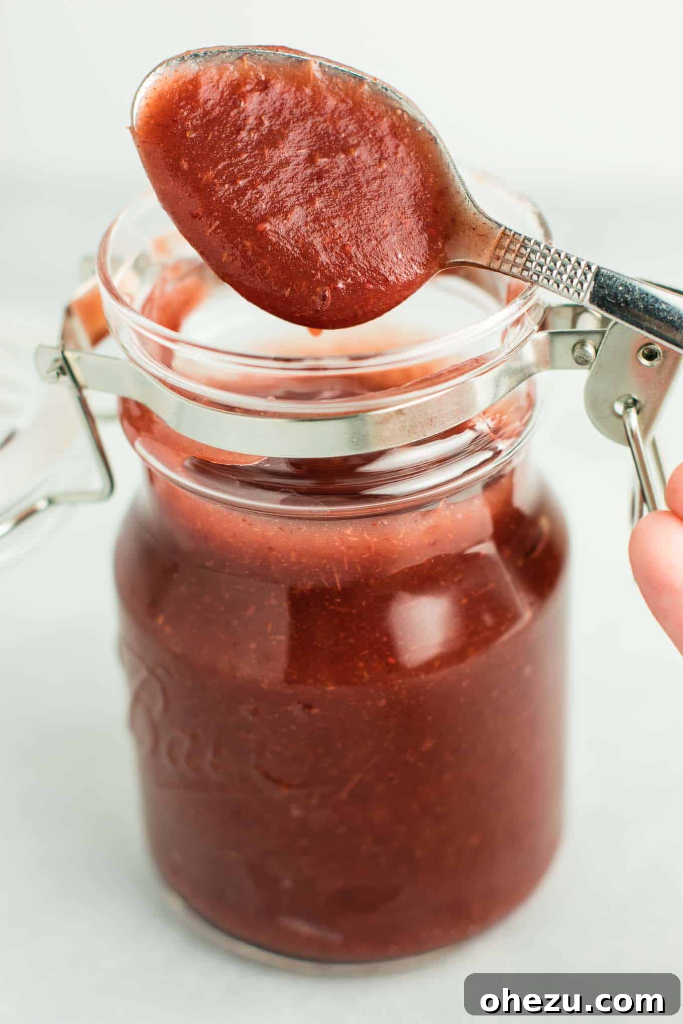 Sweet & Tangy Slow Cooker Cranberry Apple Butter 6 A close-up shot of the delicious slow cooker cranberry apple butter, ready to be enjoyed. (vegan, gluten free, naturally sweetened)