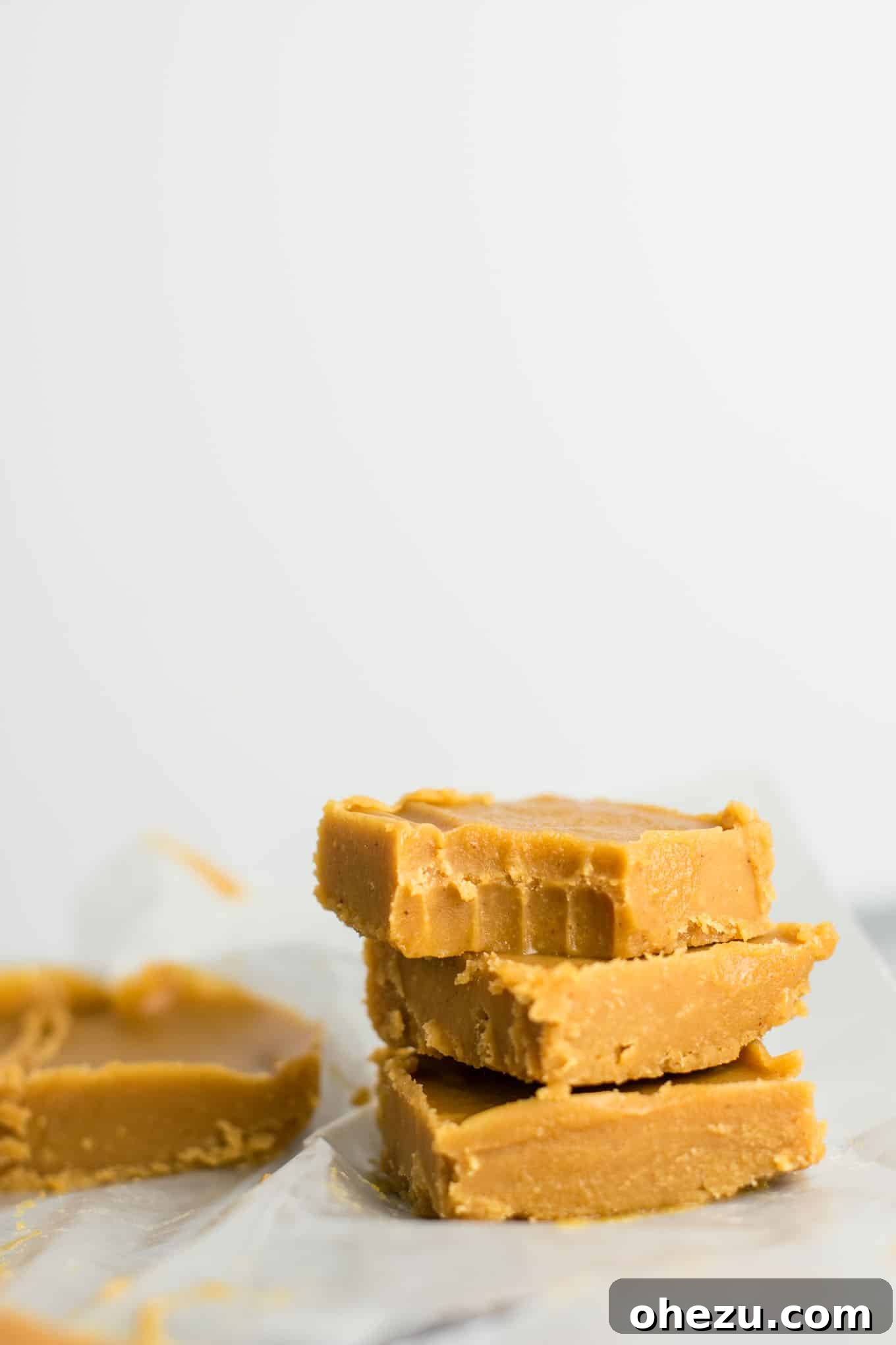 Ultimate healthy vegan peanut butter fudge recipe, showing an aerial view of a pan of fudge before cutting. #healthyfudge #healthyveganfudge #vegandessert #peanutbutter #glutenfree #vegan