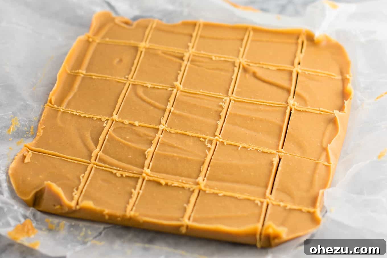 Ultimate healthy vegan peanut butter fudge recipe cut into squares. #healthyfudge #healthyveganfudge #vegandessert #peanutbutter #glutenfree #vegan