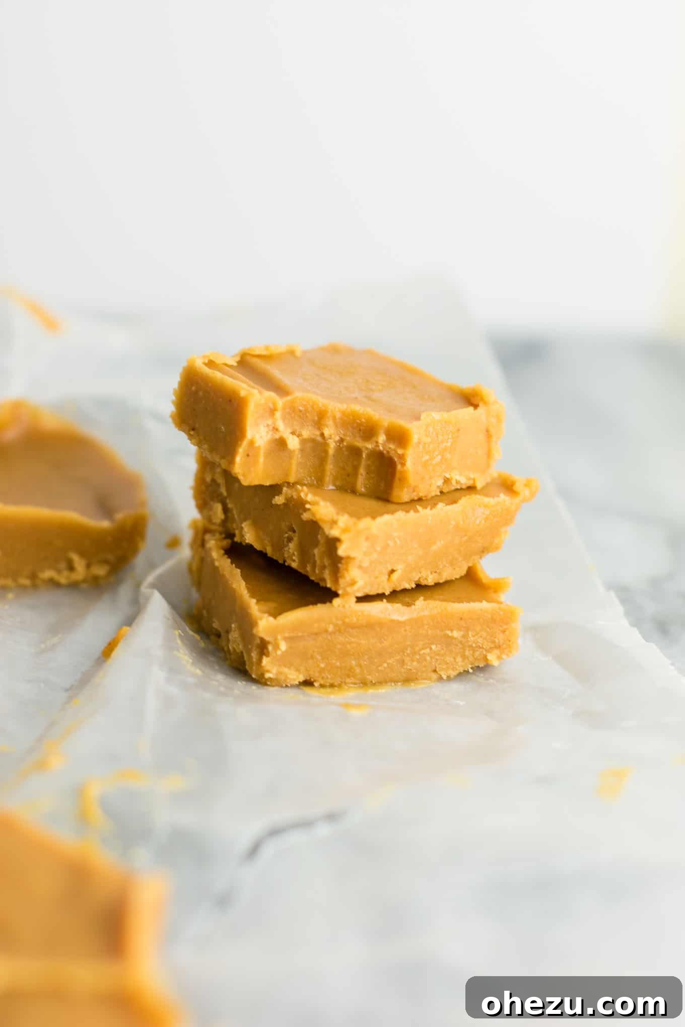 Ultimate healthy vegan peanut butter fudge recipe, showing a close-up of a piece of fudge. #healthyfudge #healthyveganfudge #vegandessert #peanutbutter #glutenfree #vegan