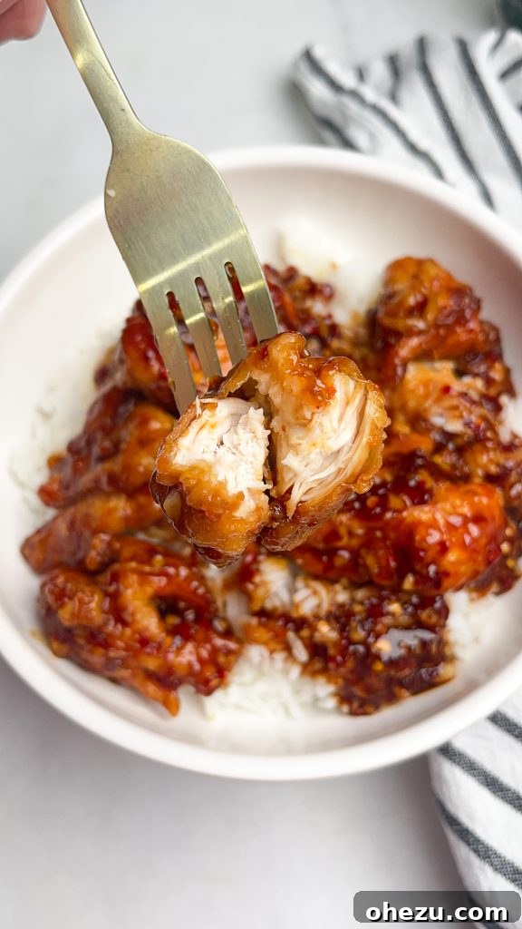 Irresistibly Crispy General Tso's Chicken Recipe 11 Plated General Tso's Chicken with garnishes
