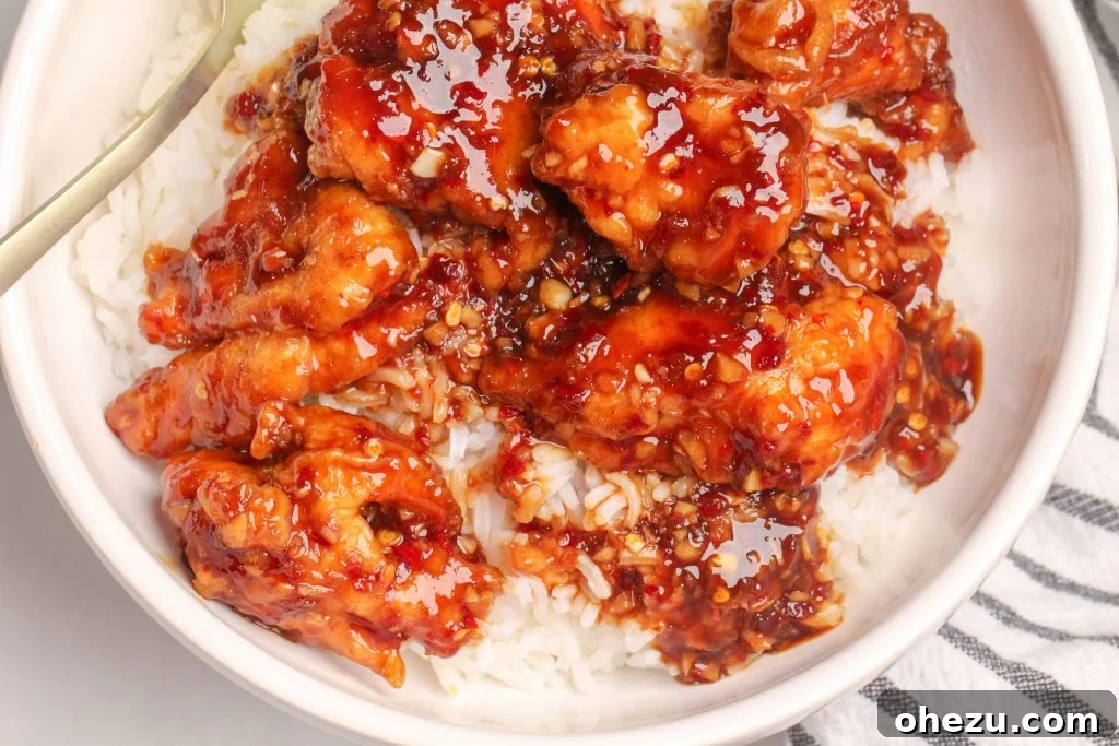 Irresistibly Crispy General Tso's Chicken Recipe 12 General Tso's Chicken served with green onions and chili