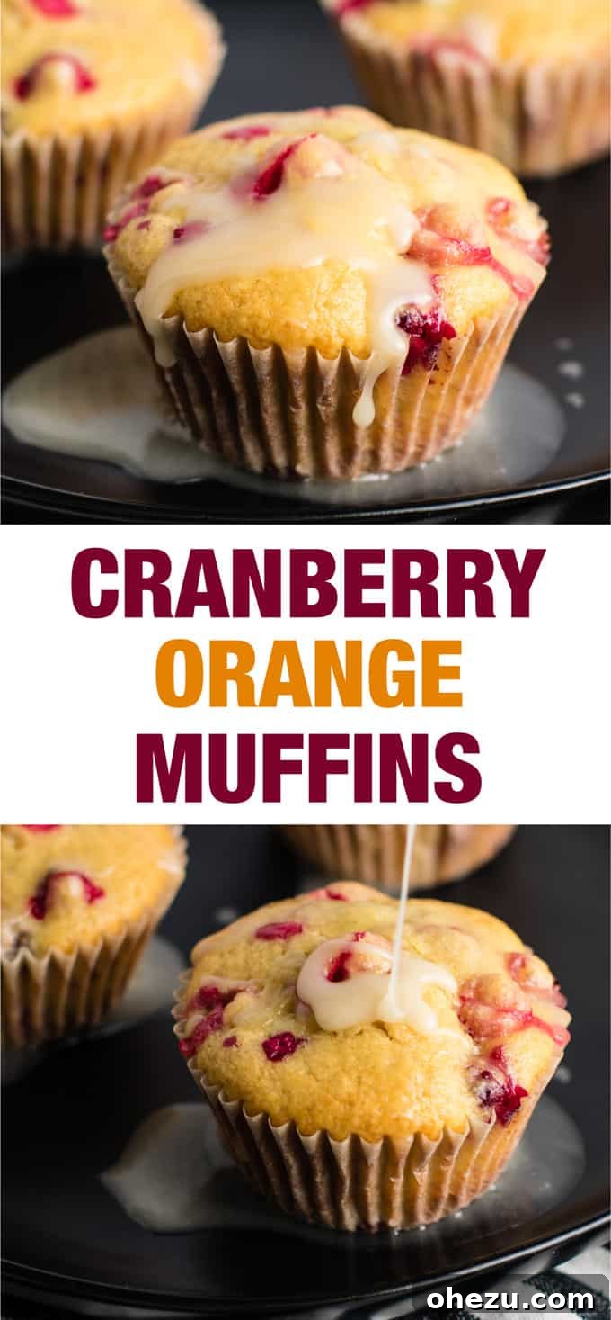 Stacked healthy cranberry orange muffins with greek yogurt on a white background.
