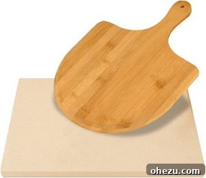 Naples' Authentic Pizza Masterpiece 7 Pizza stone and wooden paddle on a kitchen counter, ready for pizza making