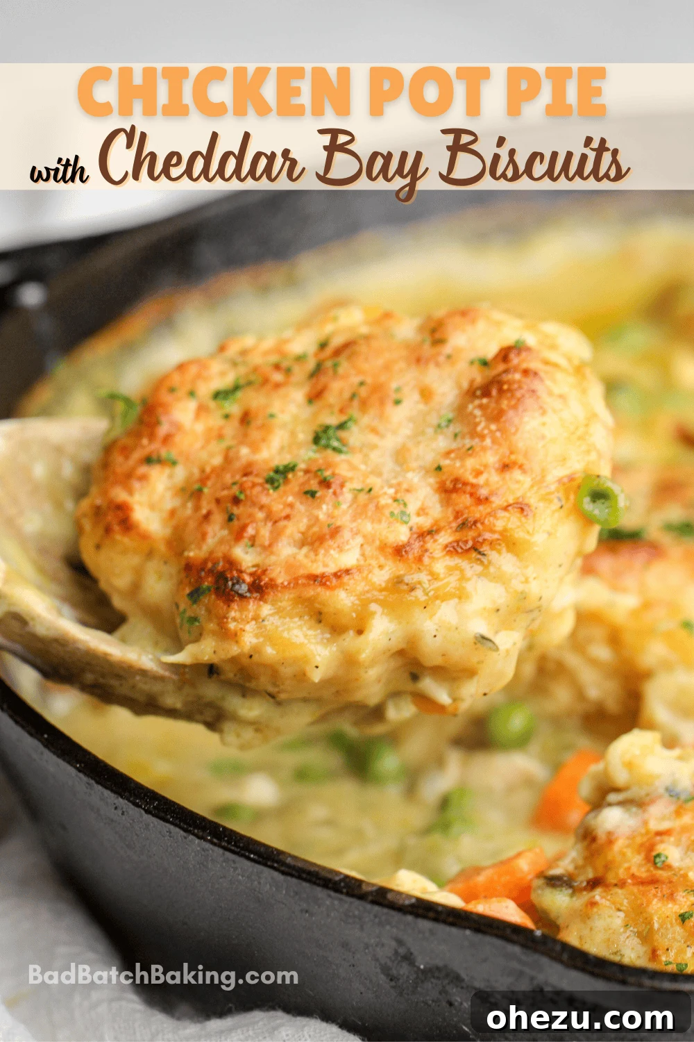 Savory Chicken Pot Pie Crowned with Cheddar Bay Biscuits 13 A top-down view of the chicken pot pie with cheddar bay biscuits in a cast iron skillet, ready to be served.