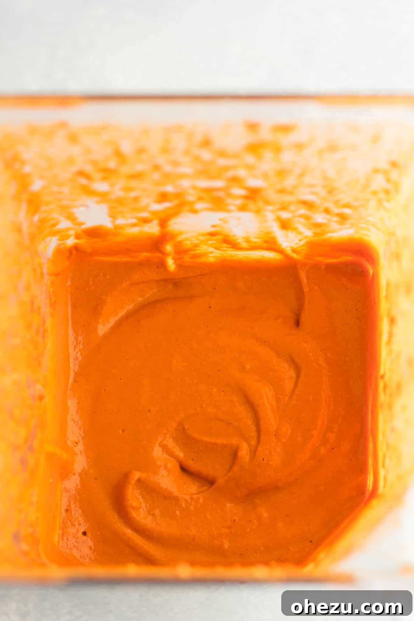 Close-up of the smooth, creamy cashew enchilada sauce in a blender