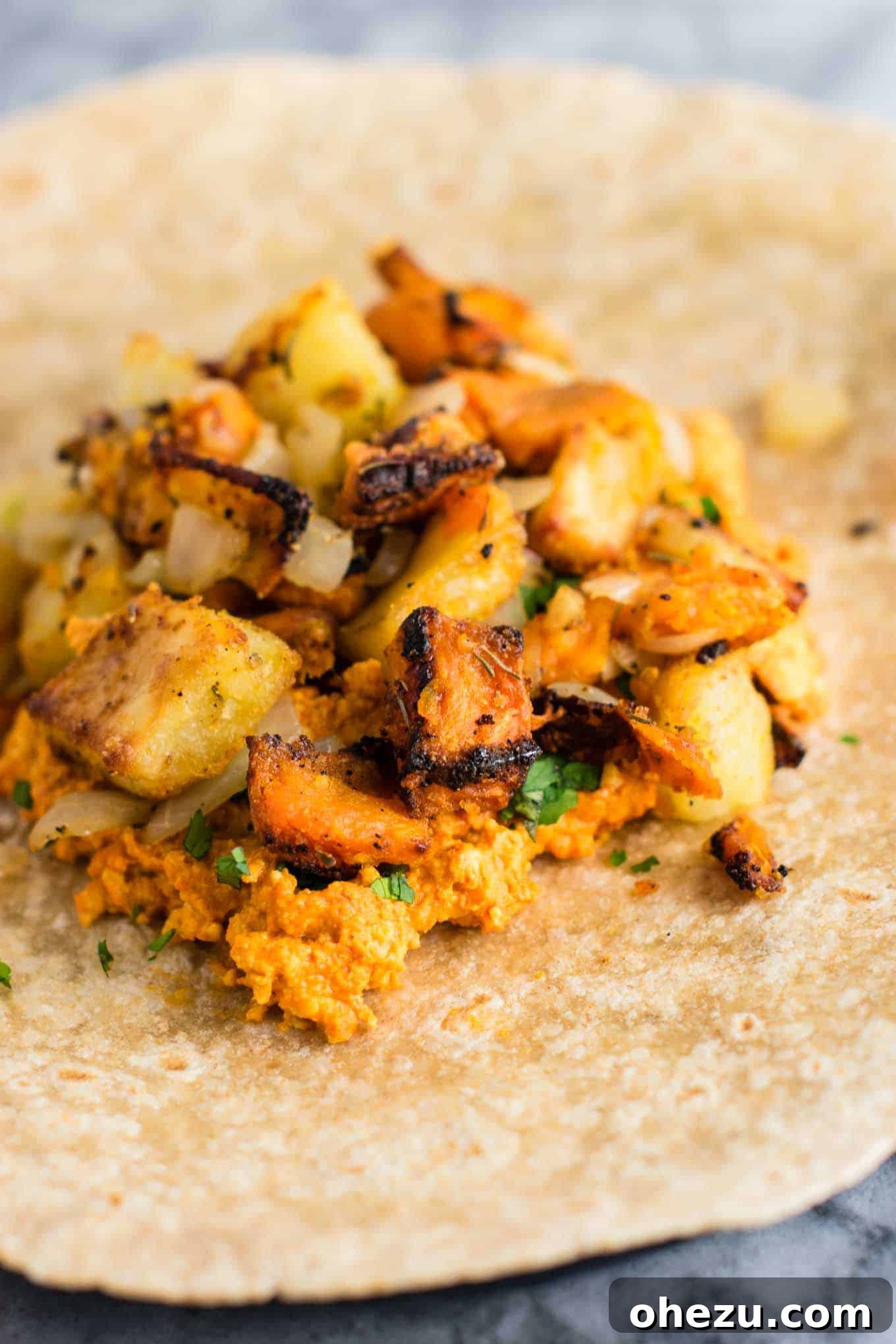 A large pan filled with golden-brown, perfectly roasted breakfast hash